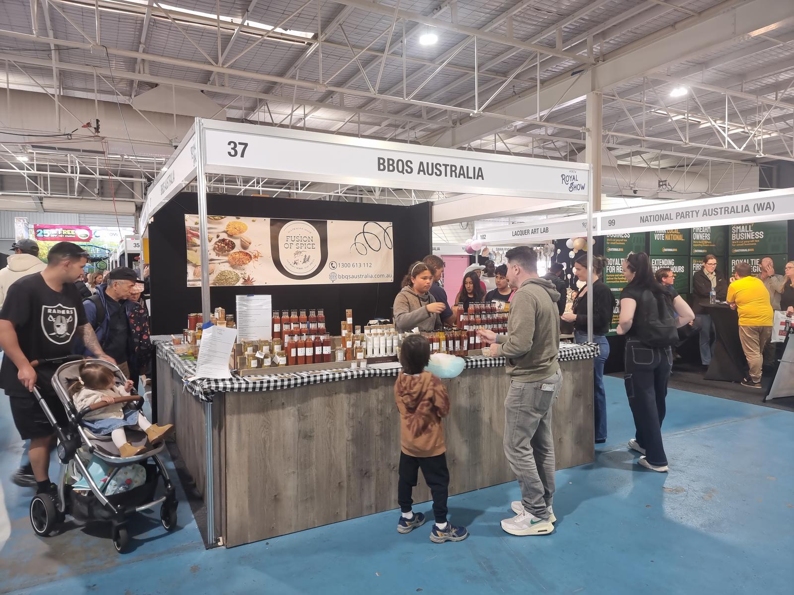 Happy Customers having a look at our tasty sauces