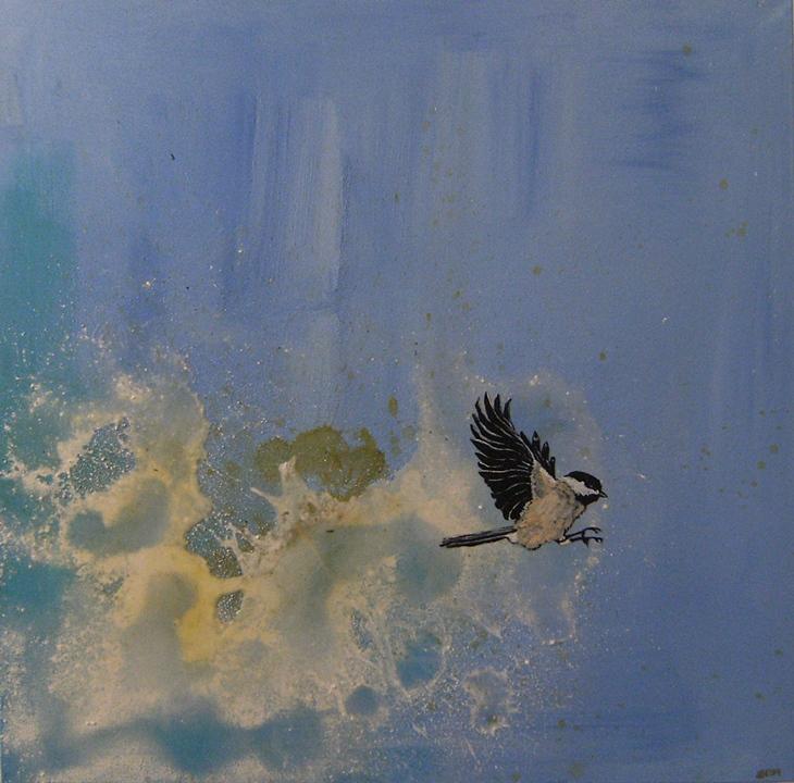 Chickadee flying