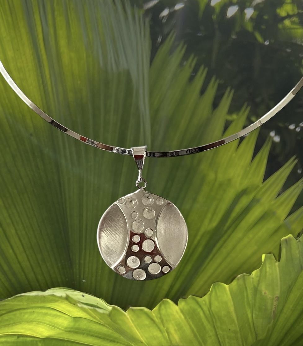 Silver double sided pendant from precious metal clay