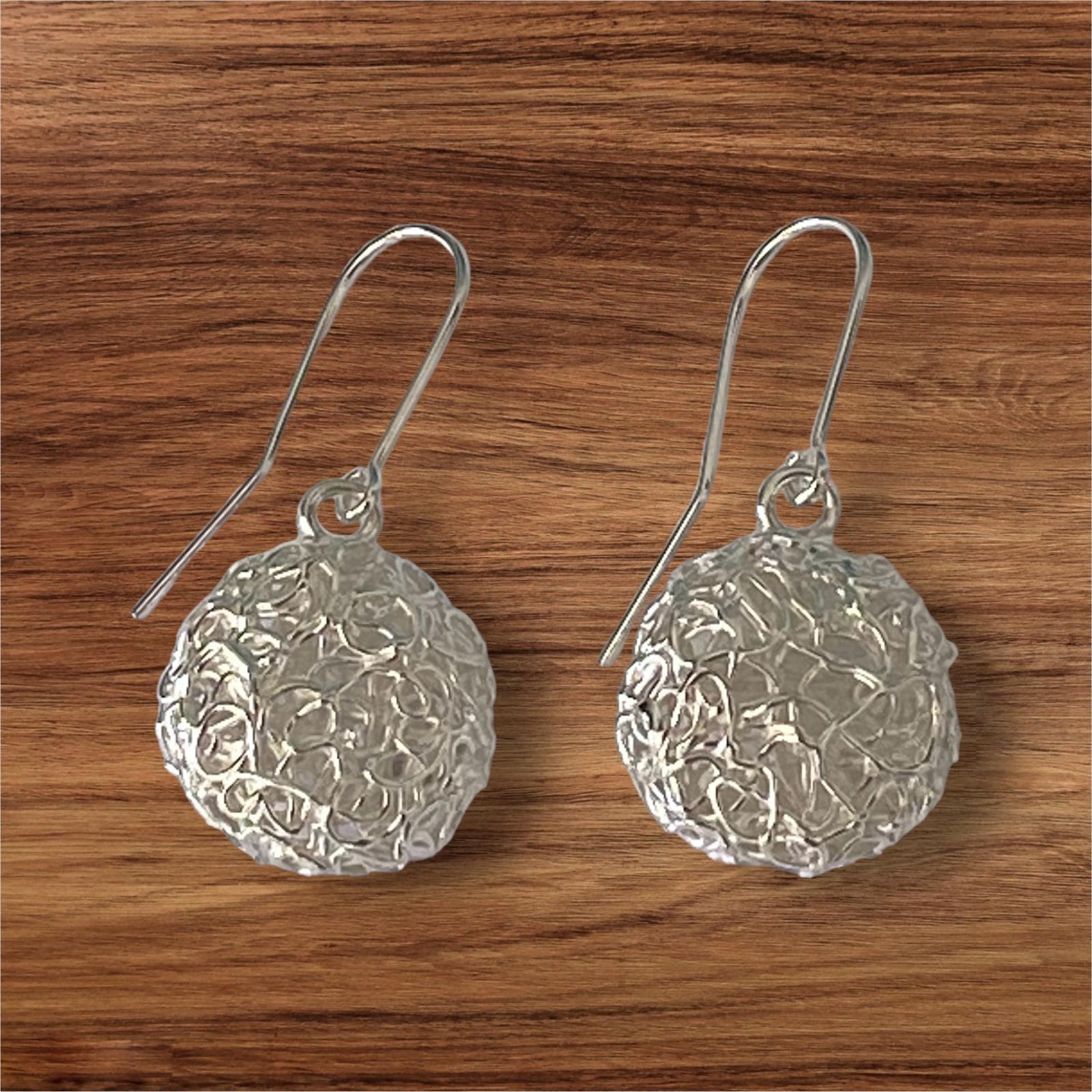Silver filigree earrings from precious metal clay