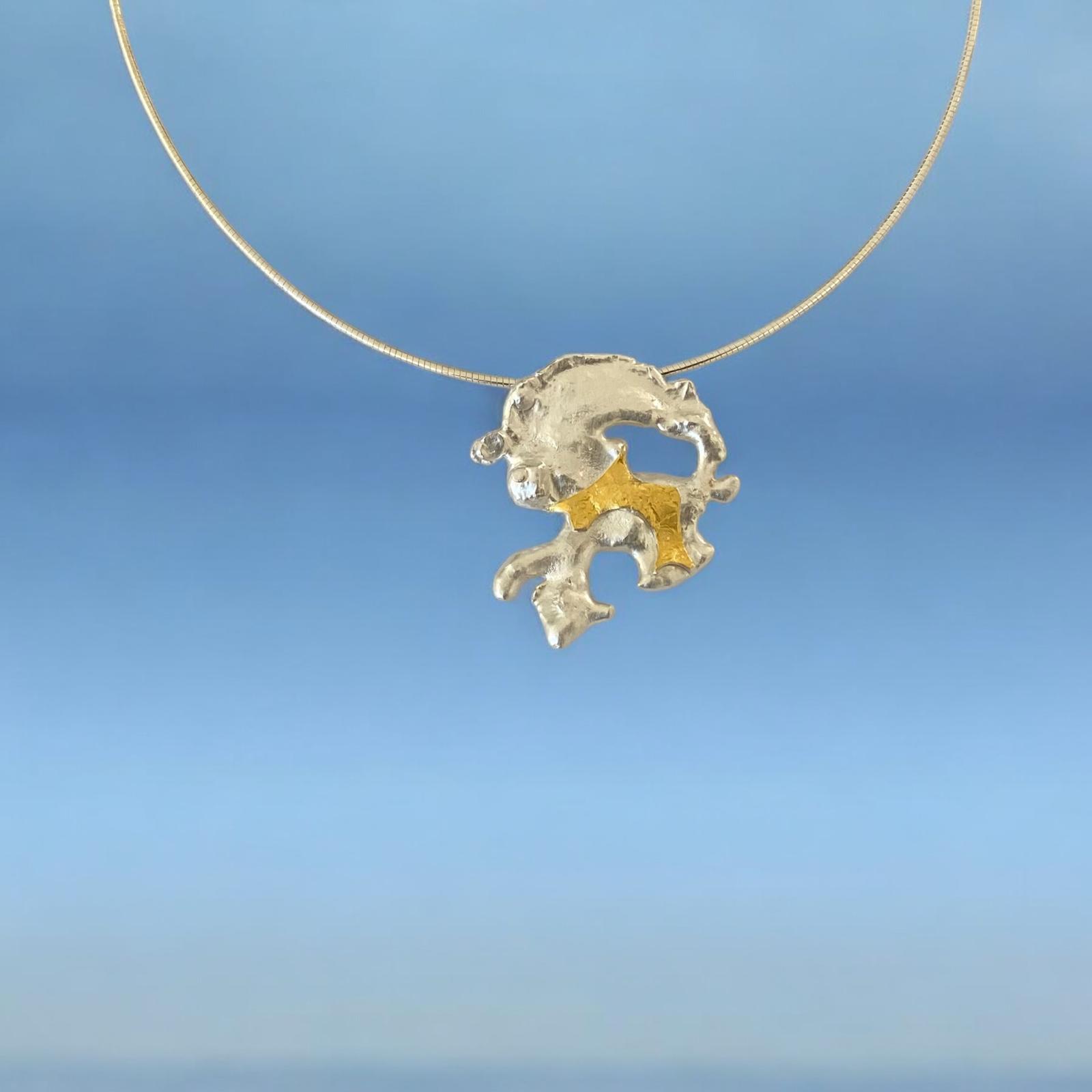 Silver pendant with gold (made by using the watercasting with Keumboo)