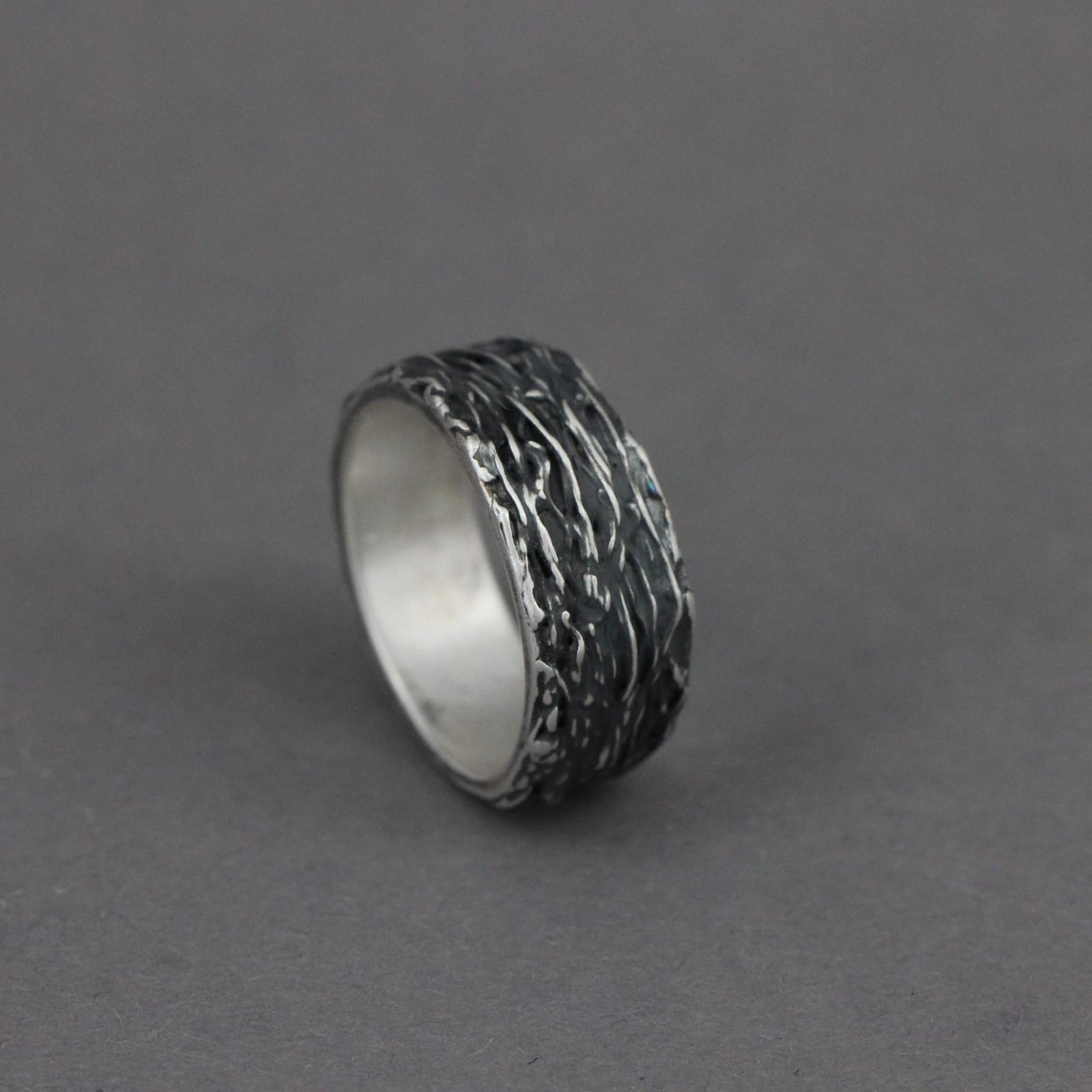 Silver ring with patina