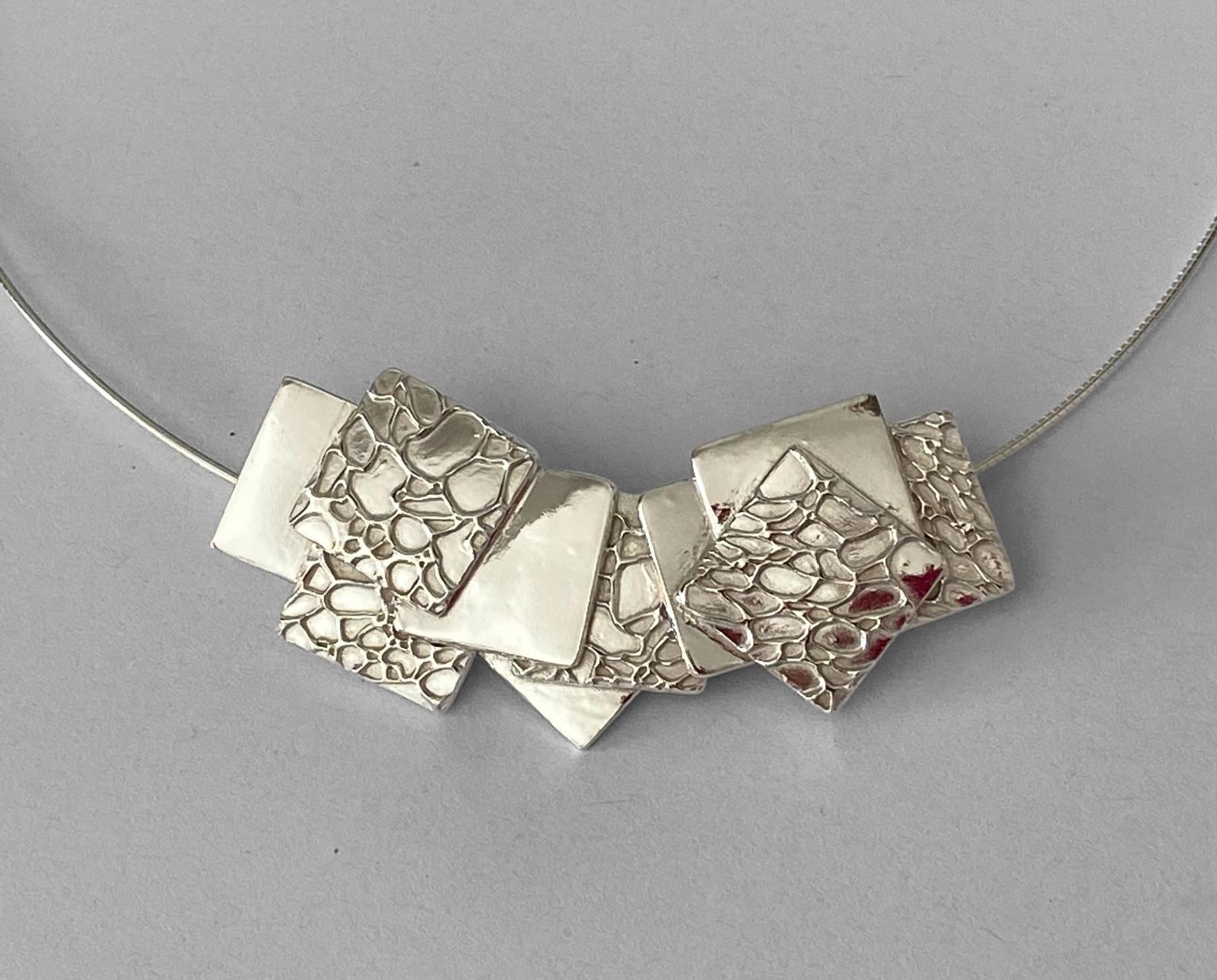 Multiple square silver pendant from precious metal clay