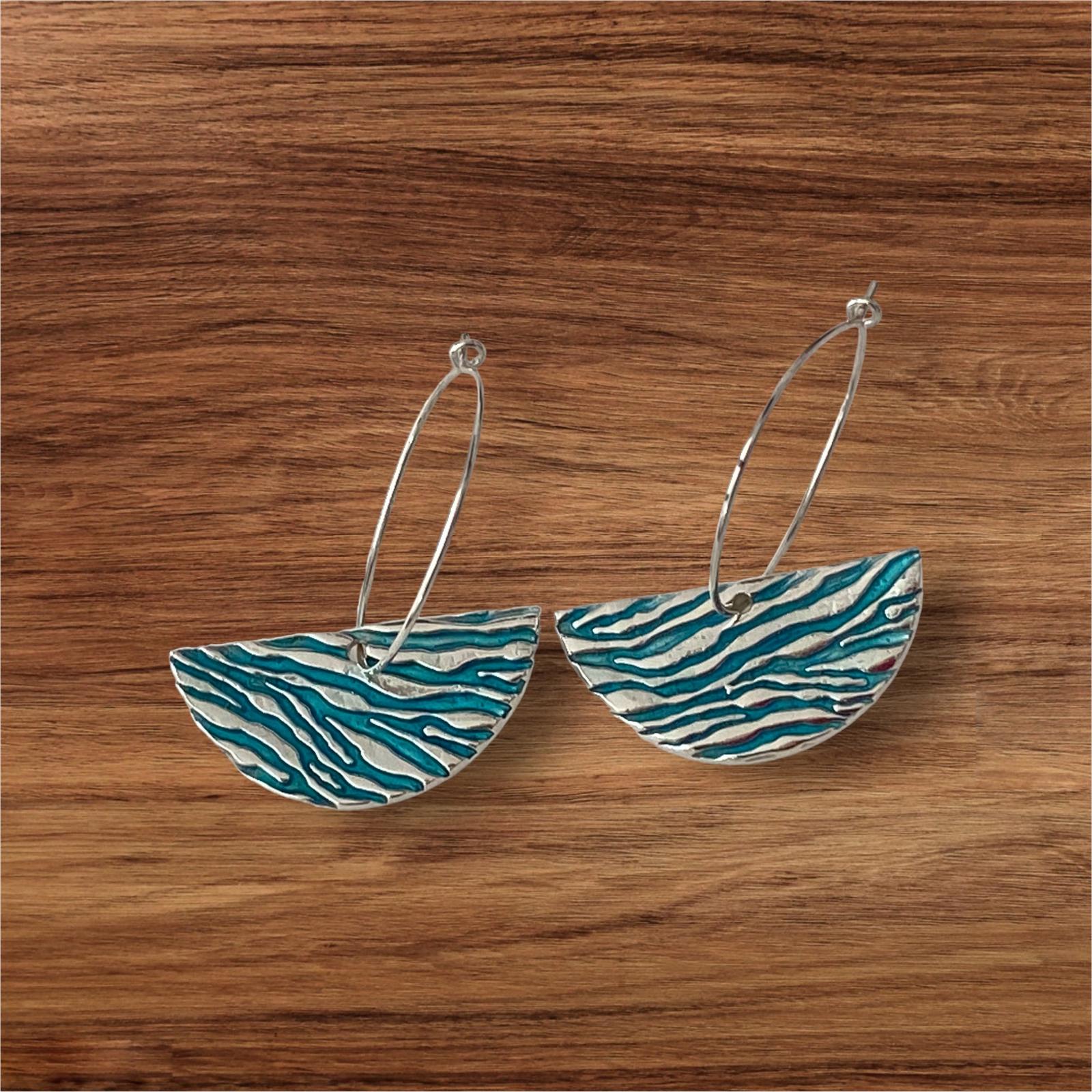 Silver earrings from precious metal clay with uv-resin