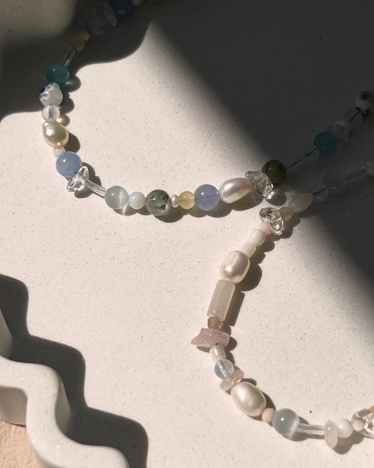 Precious gems, pearls and crystals necklaces