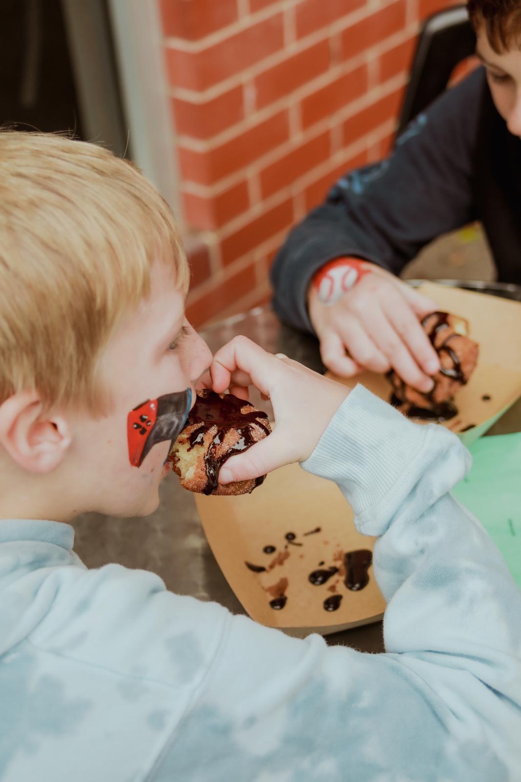 Enjoying a donut with drizzle