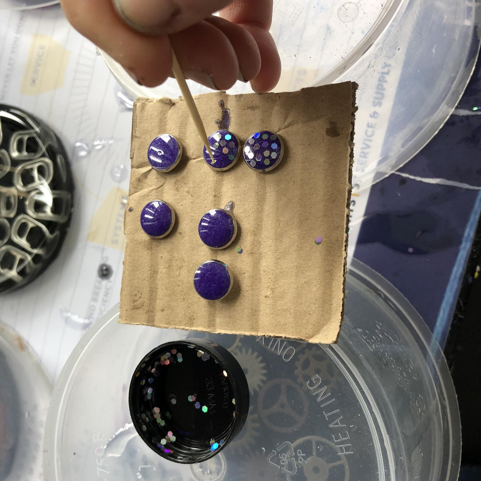 Earrings in the process of being made