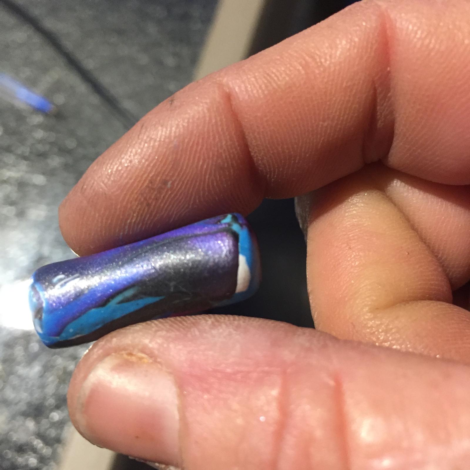 In the process of making cylinder beads for my polymer clay bangles