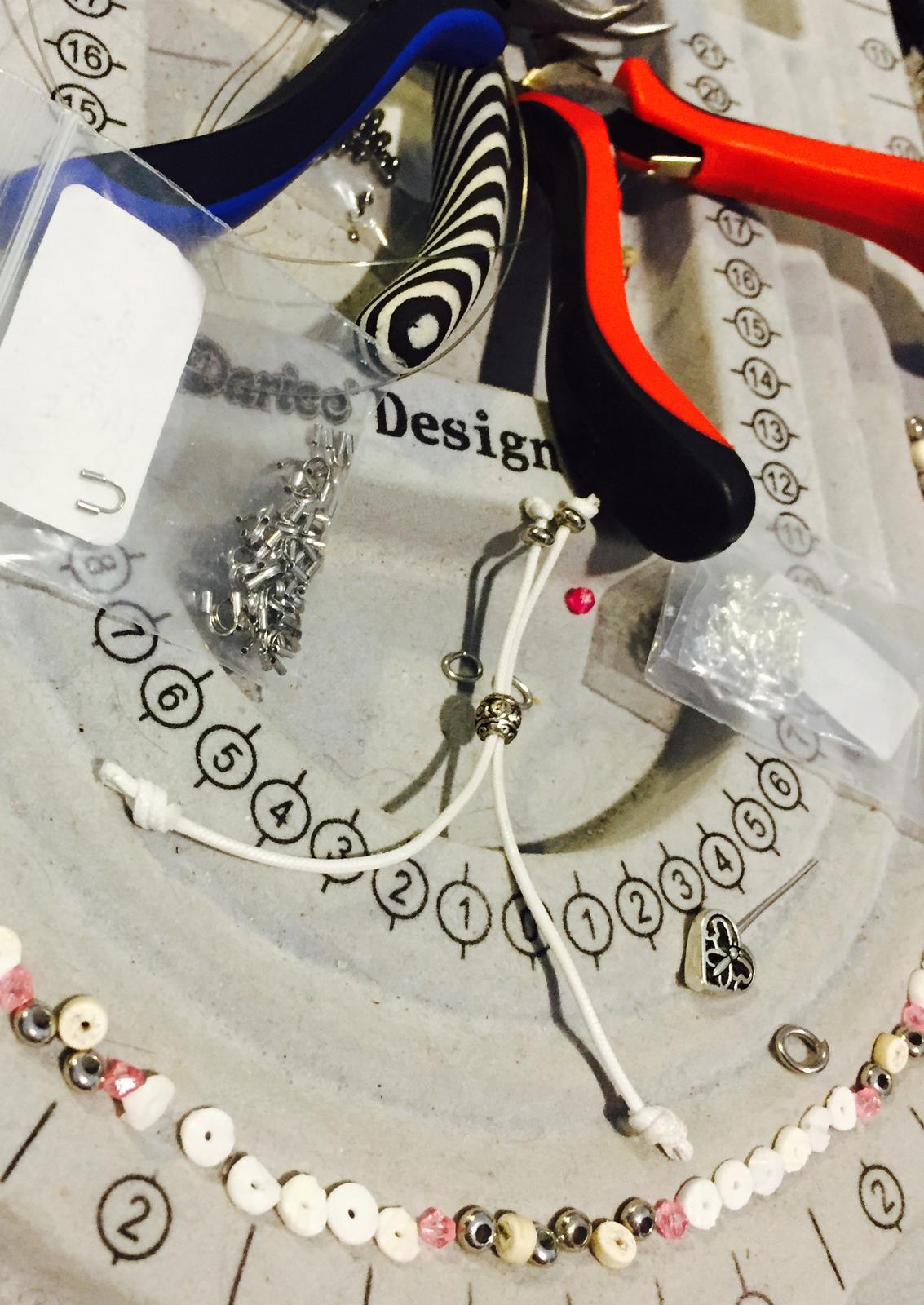 An anklet that is being restrung