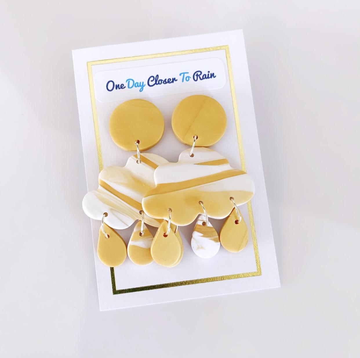Polymer clay earrings ~ rain clouds purchased are donated to drought relief