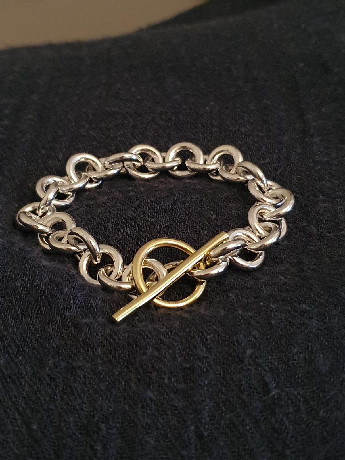 Chunky silver bracelet with brass toggle
