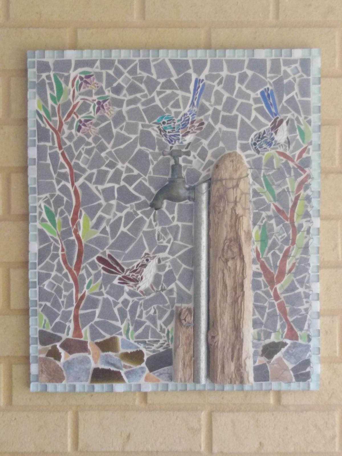 Wrens on tap with wood and wire