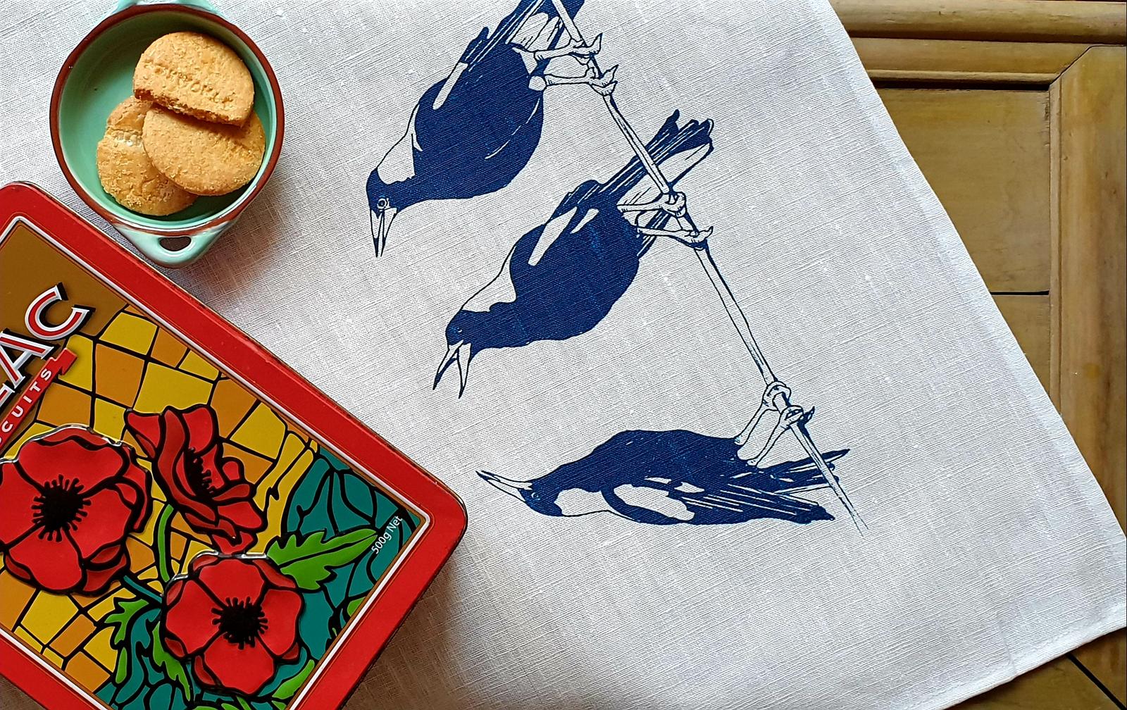 Magpies tea towel
