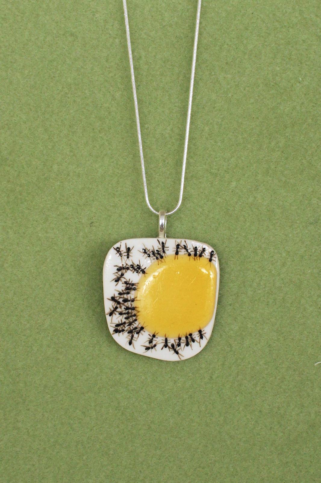 Ceramic pendant with handpainted ant design
