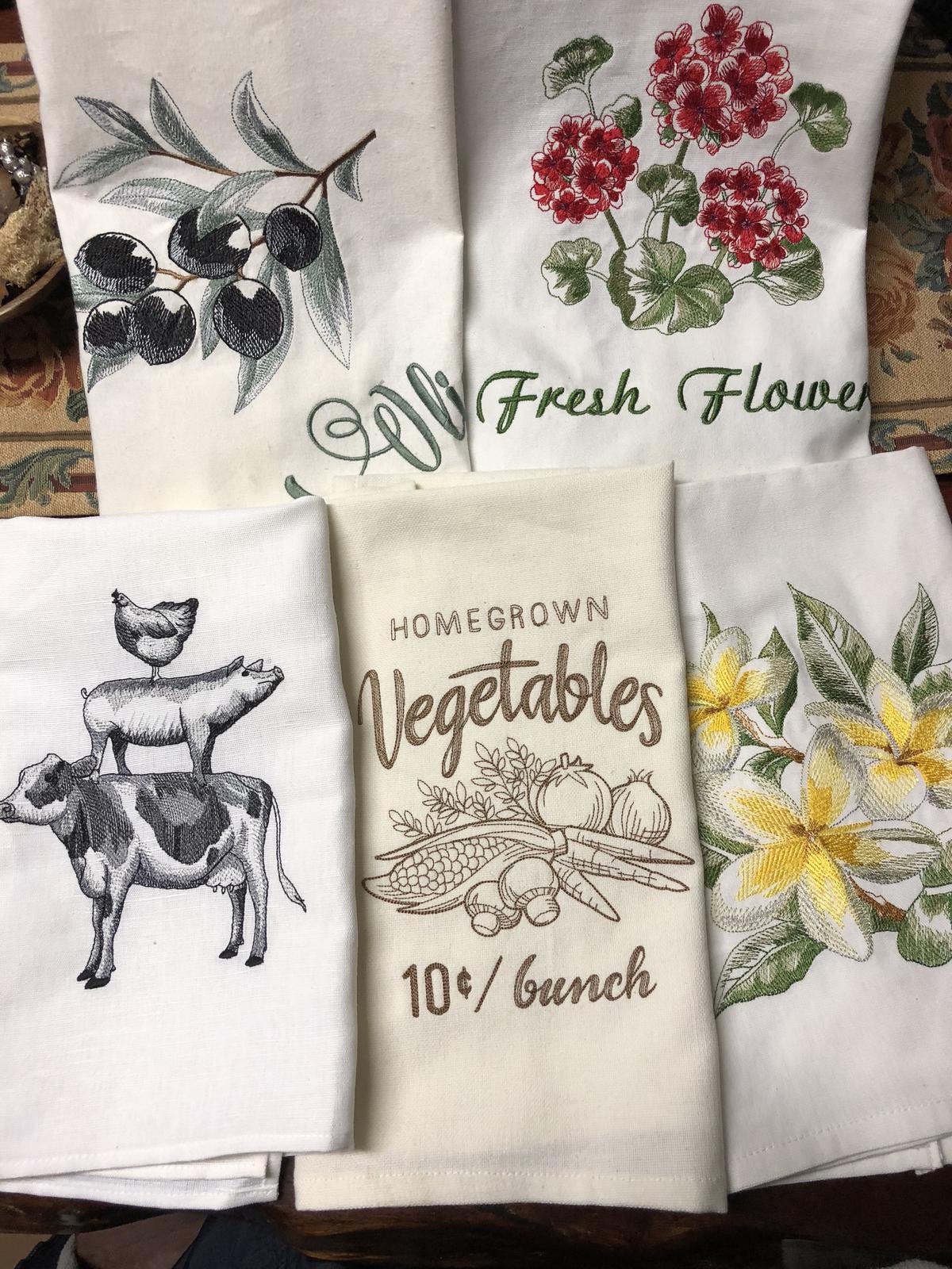 Designs for both tea towels and shopping bags