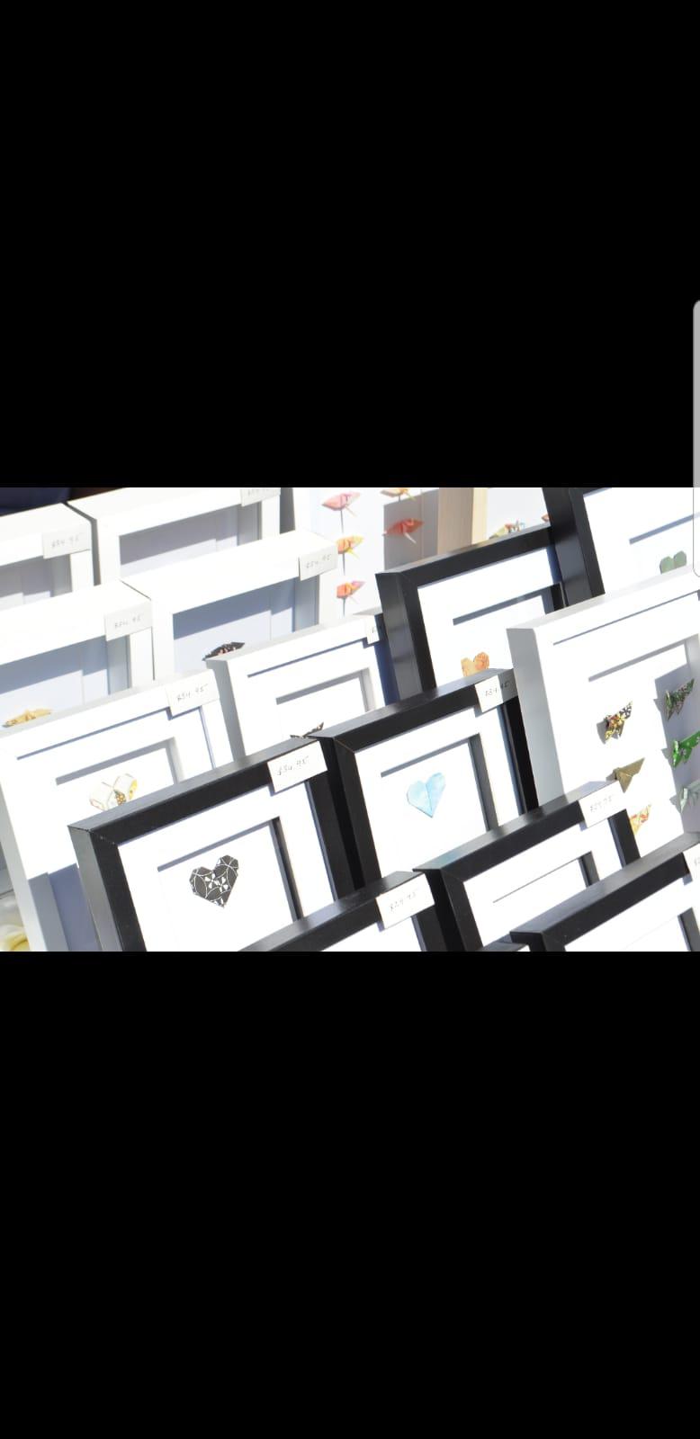 Framed origami art stall set up