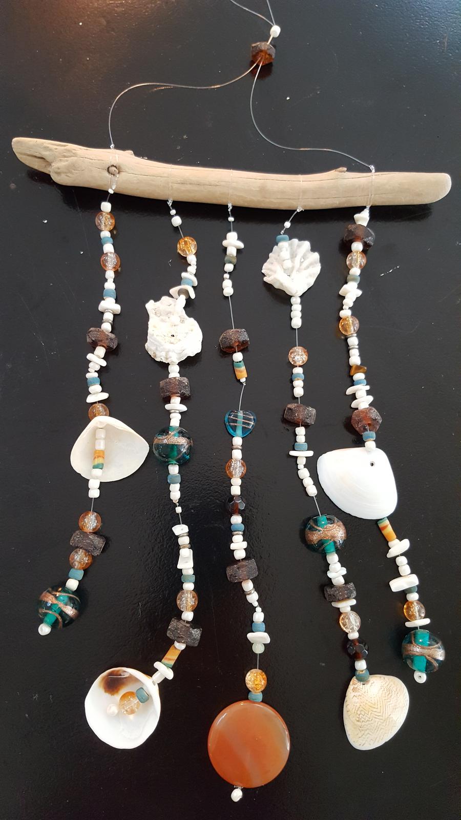 Driftwood, carnelian, shells and glass beads