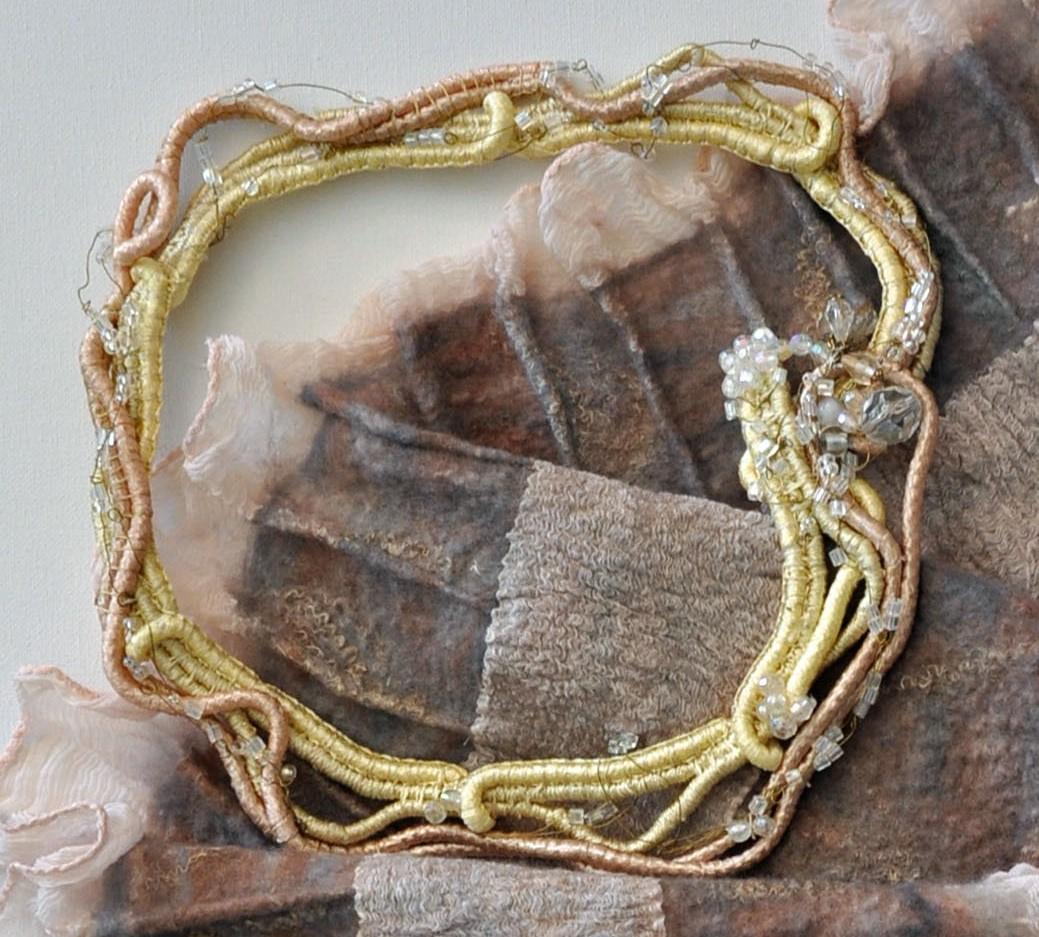 Cord and beaded necklace and nuno scarf
