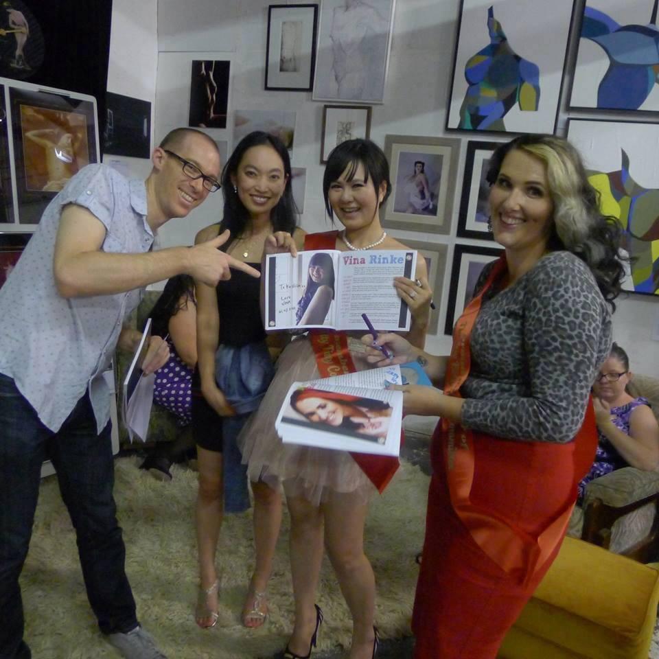 Participants of one of our books with the books.