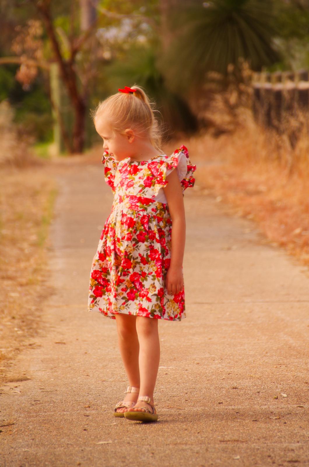 Elsie Ruffle Pinafore - Christmas floral