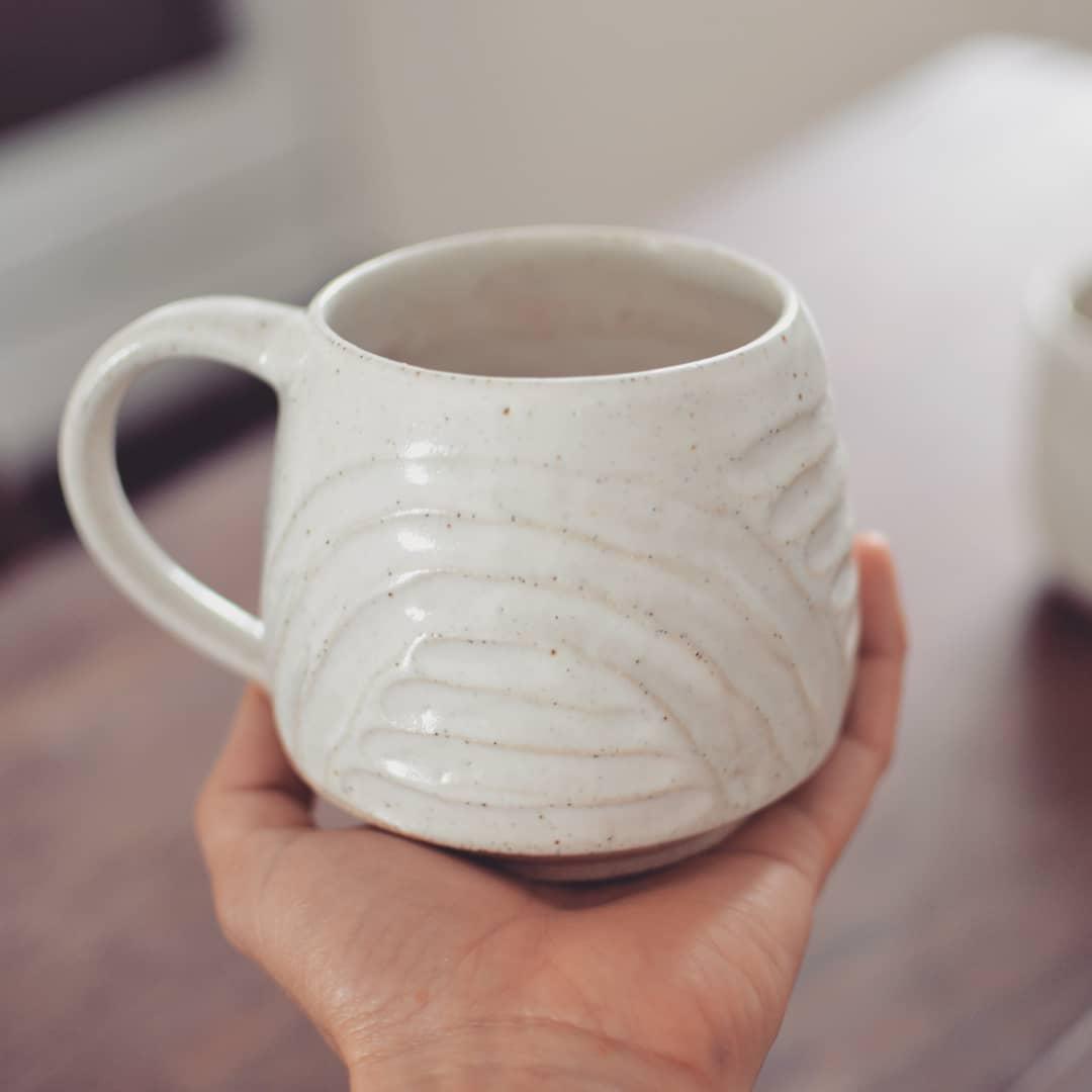 Carved stoneware mug