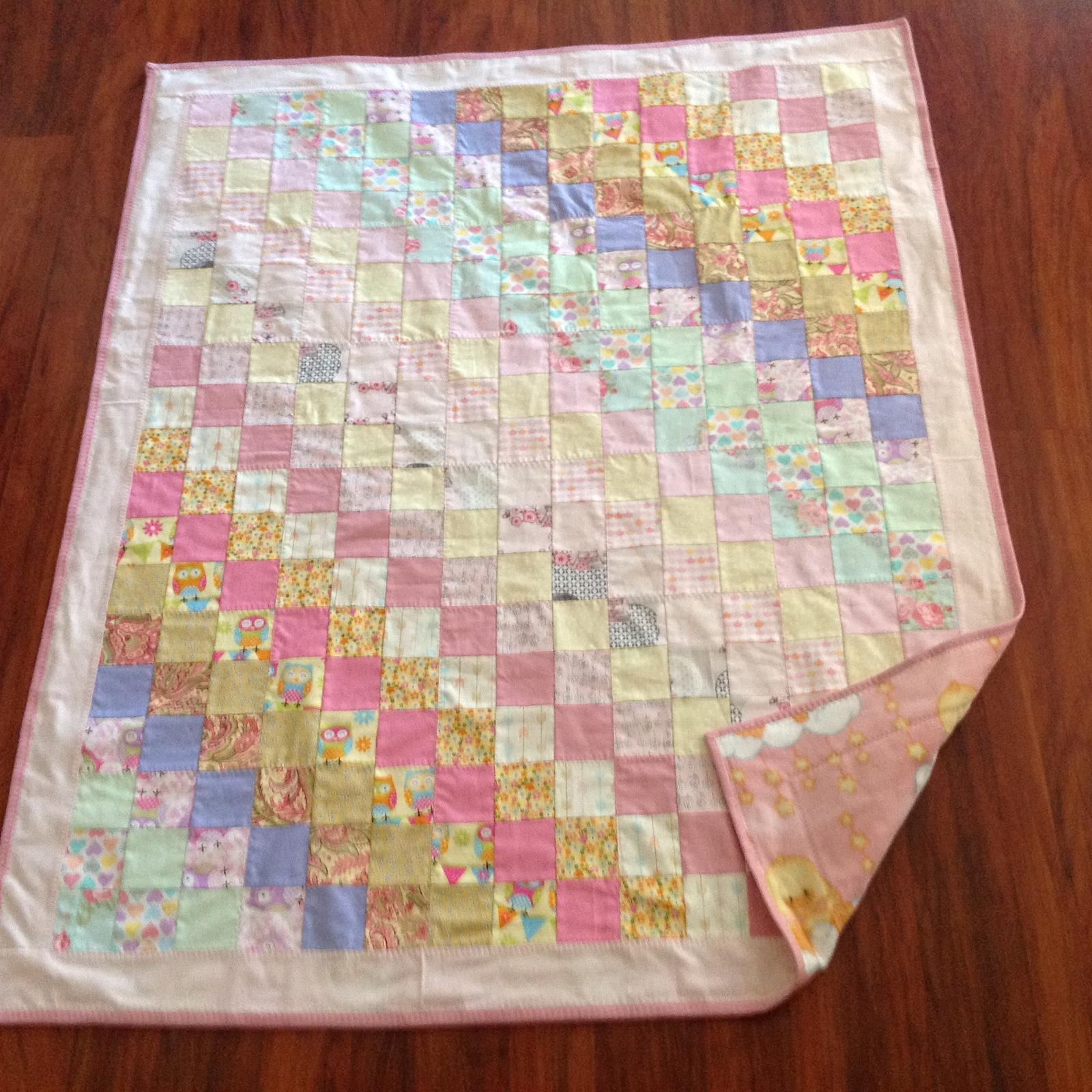 Pink blocks cot quilt