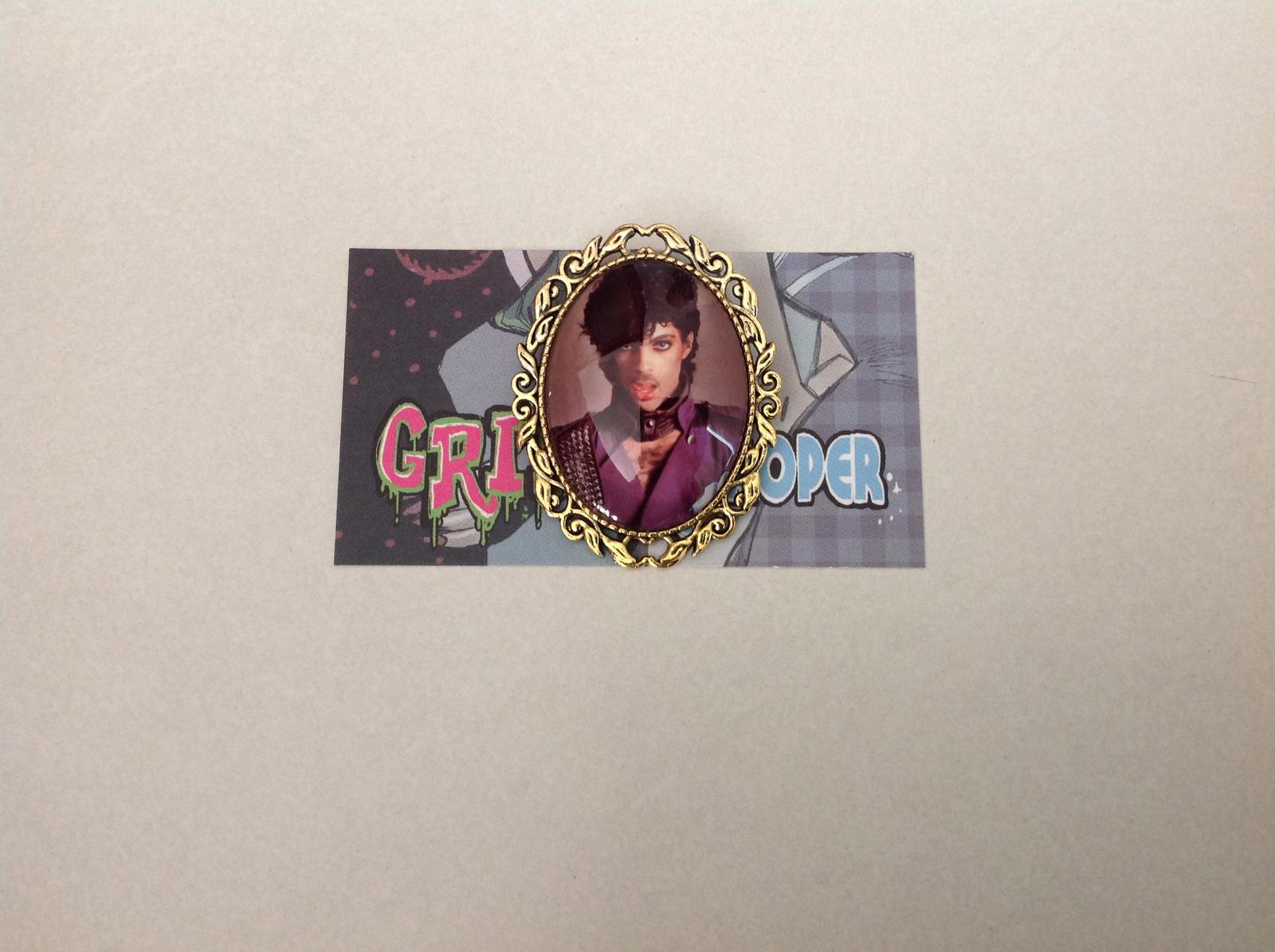 Prince brooch