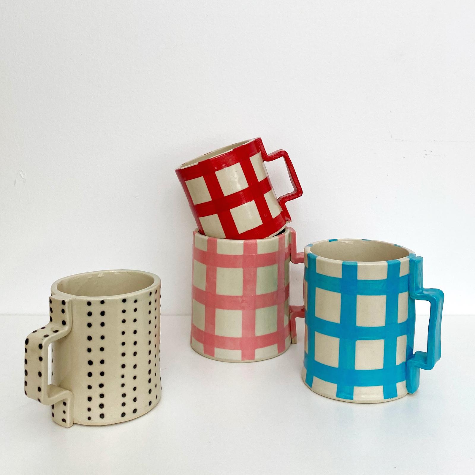 Collection of hand built mugs