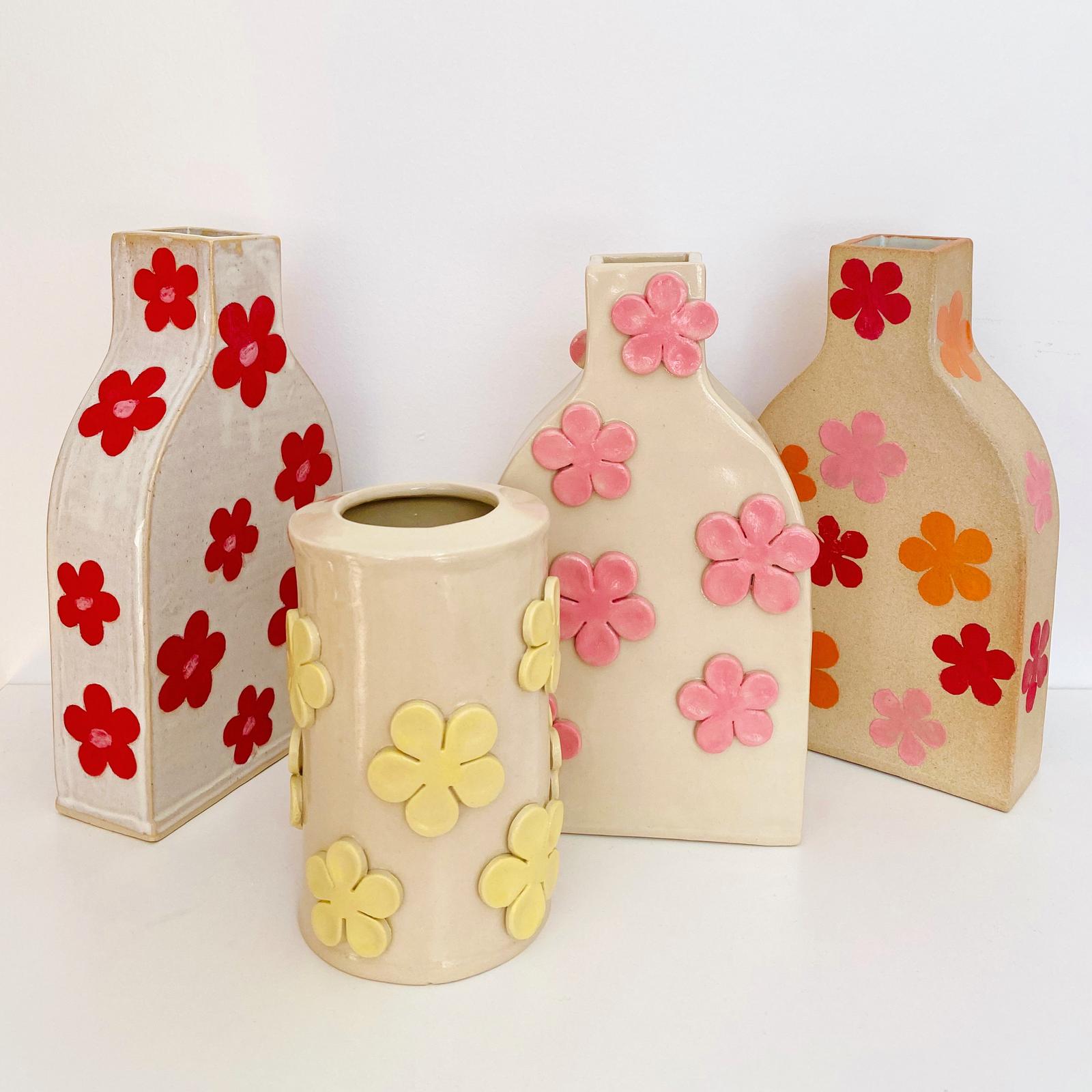 Assortment of vases with 3D flowers and motifs