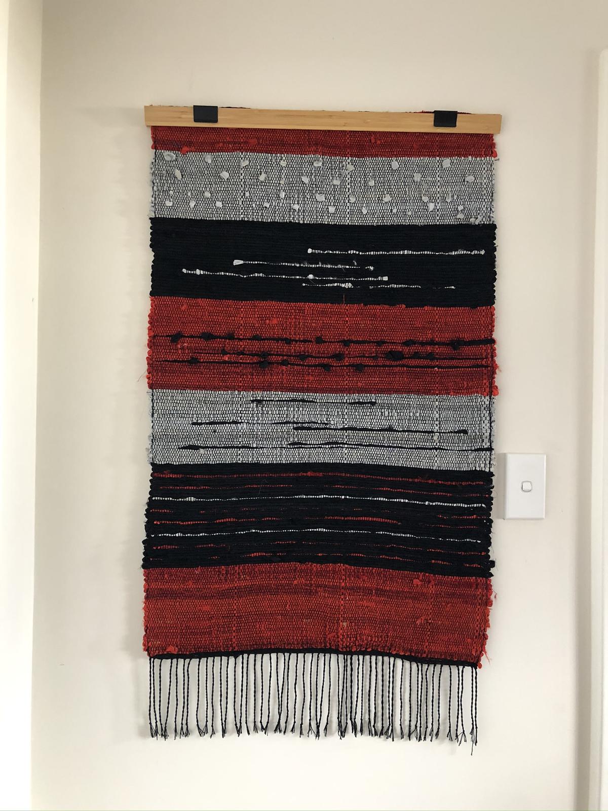 Weaved in sari silk.