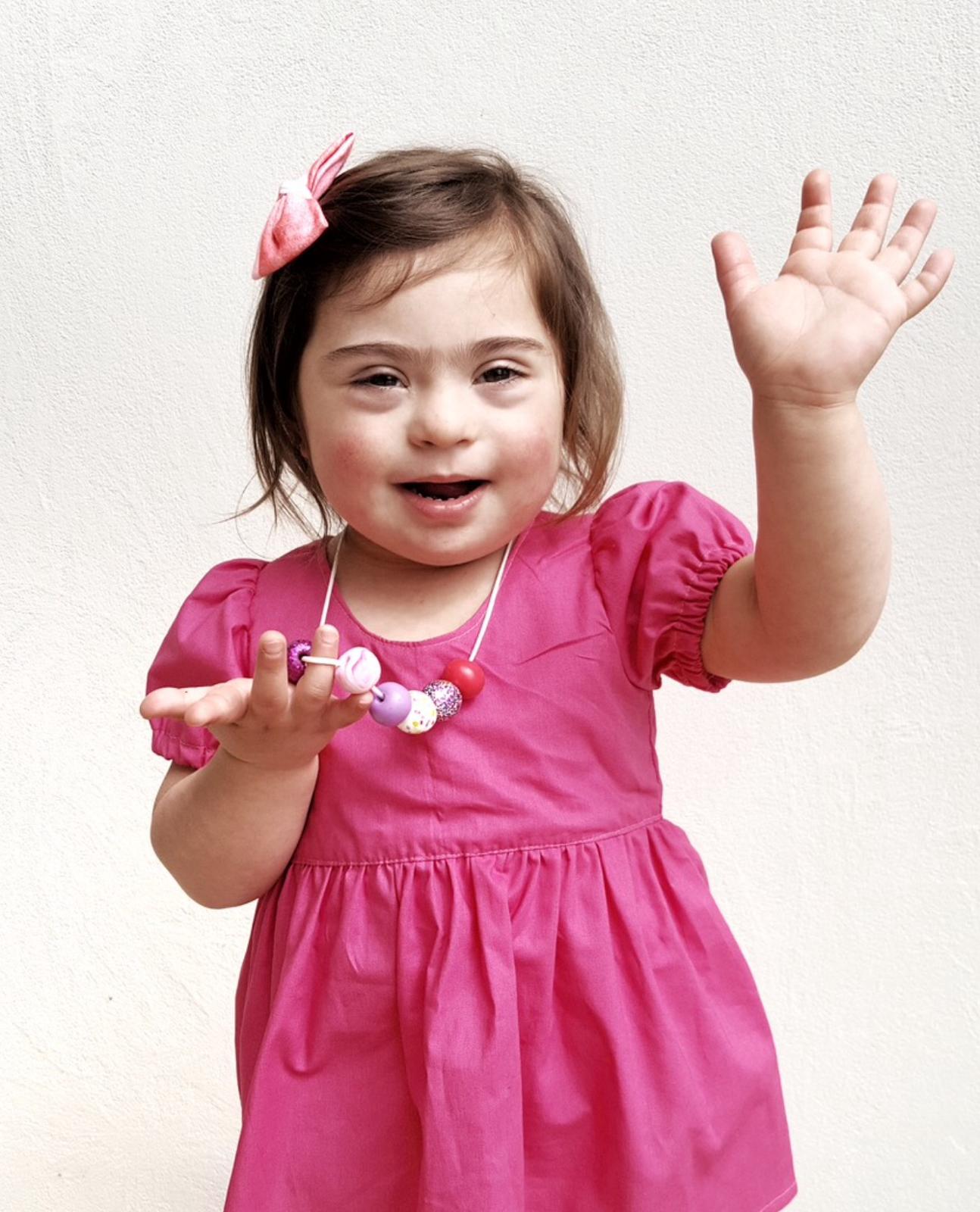 Jazzy wearing Cupcakes necklace