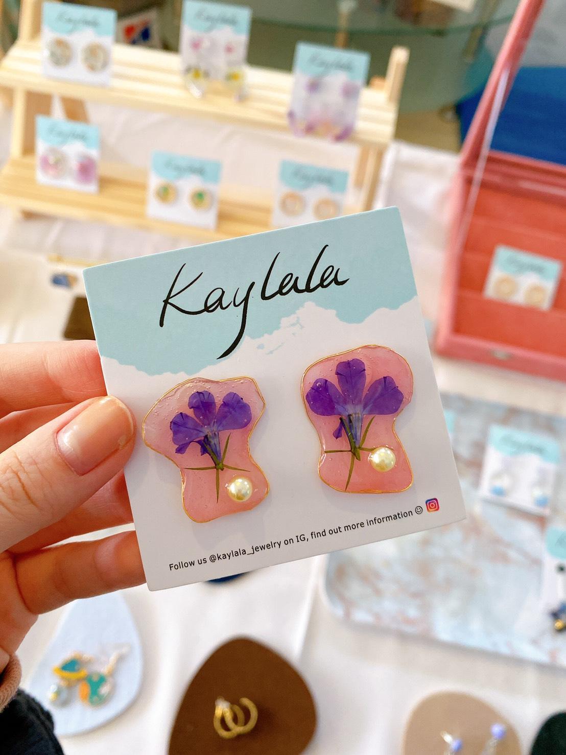 Handmade resin earrings using our own dried flowers