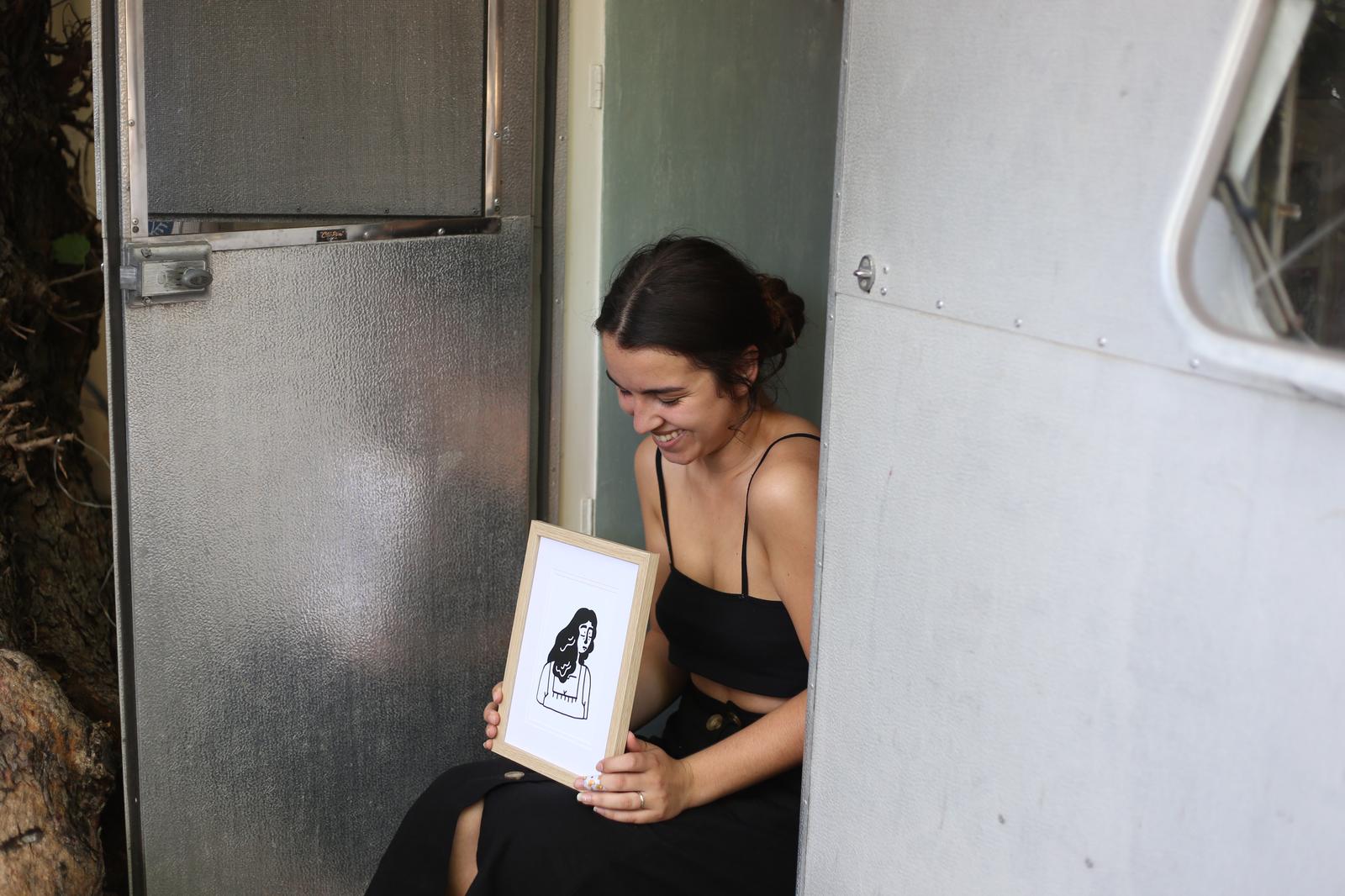 Kikitsa Draws Frame, outside caravan