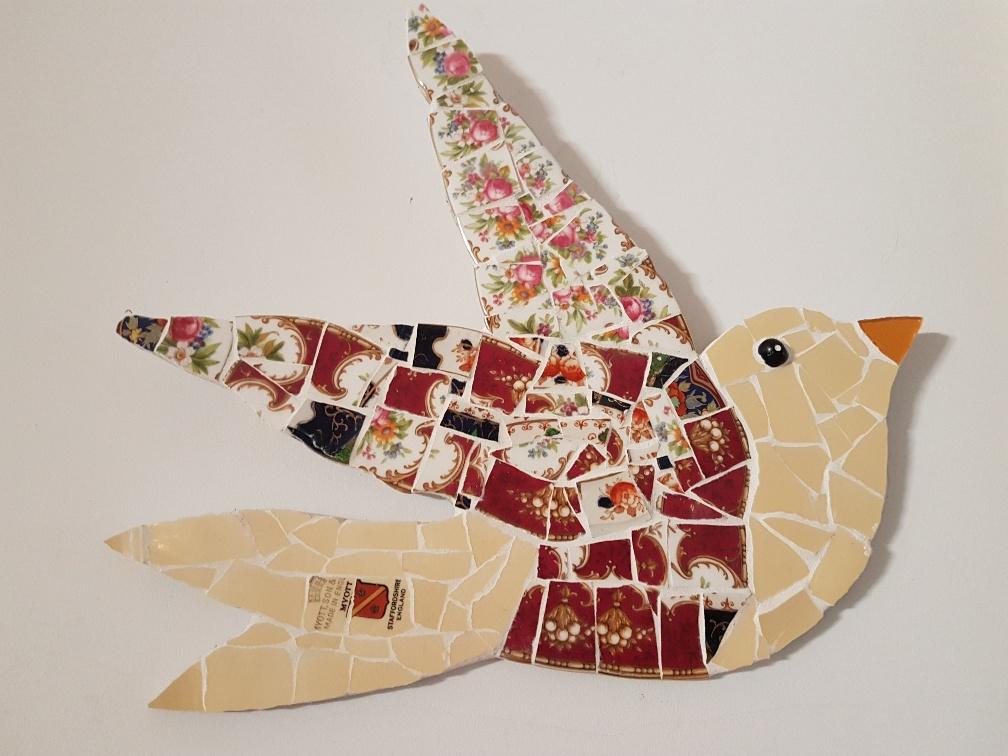 flying mosaic bird