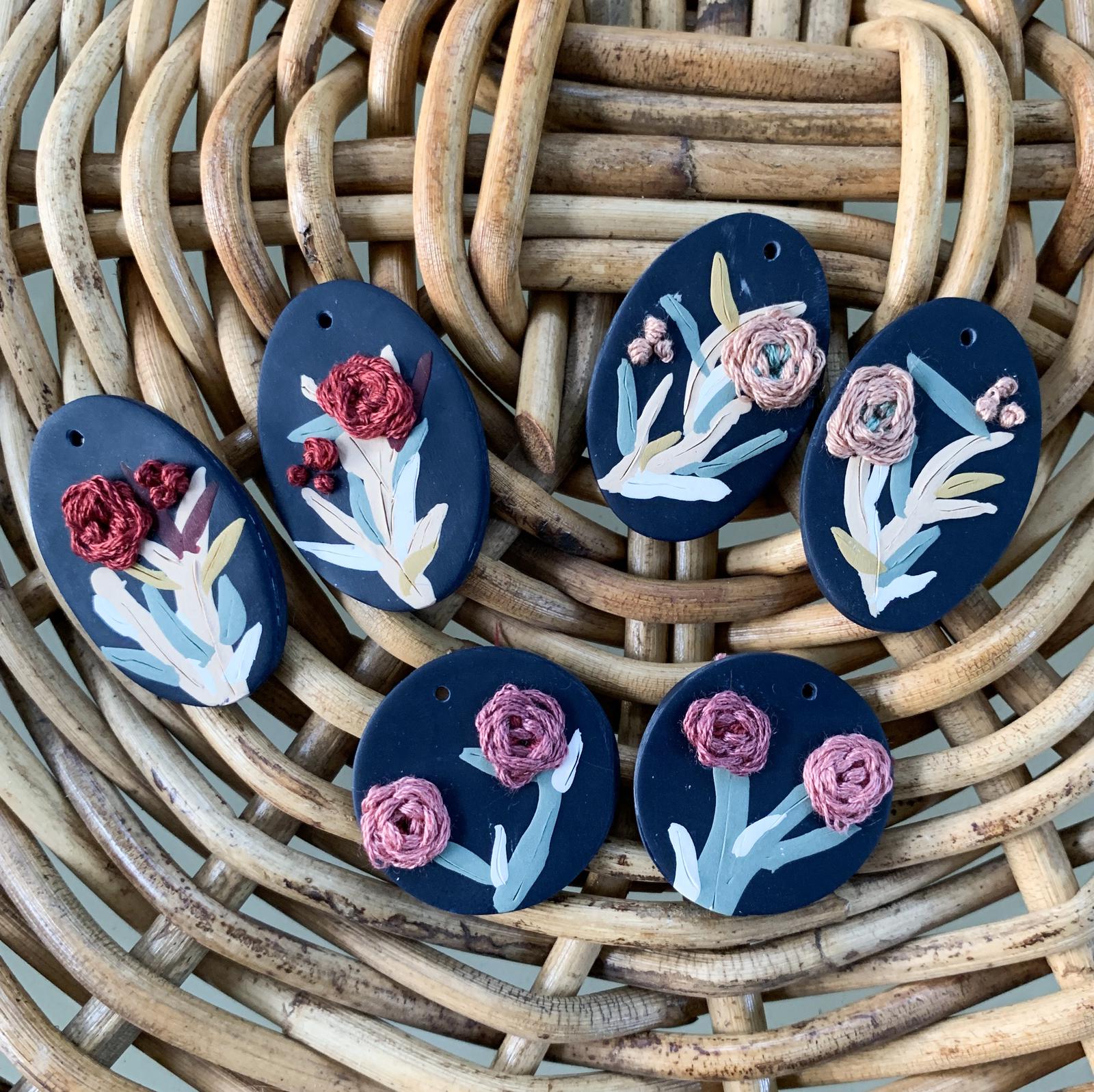 Embroidery and clay