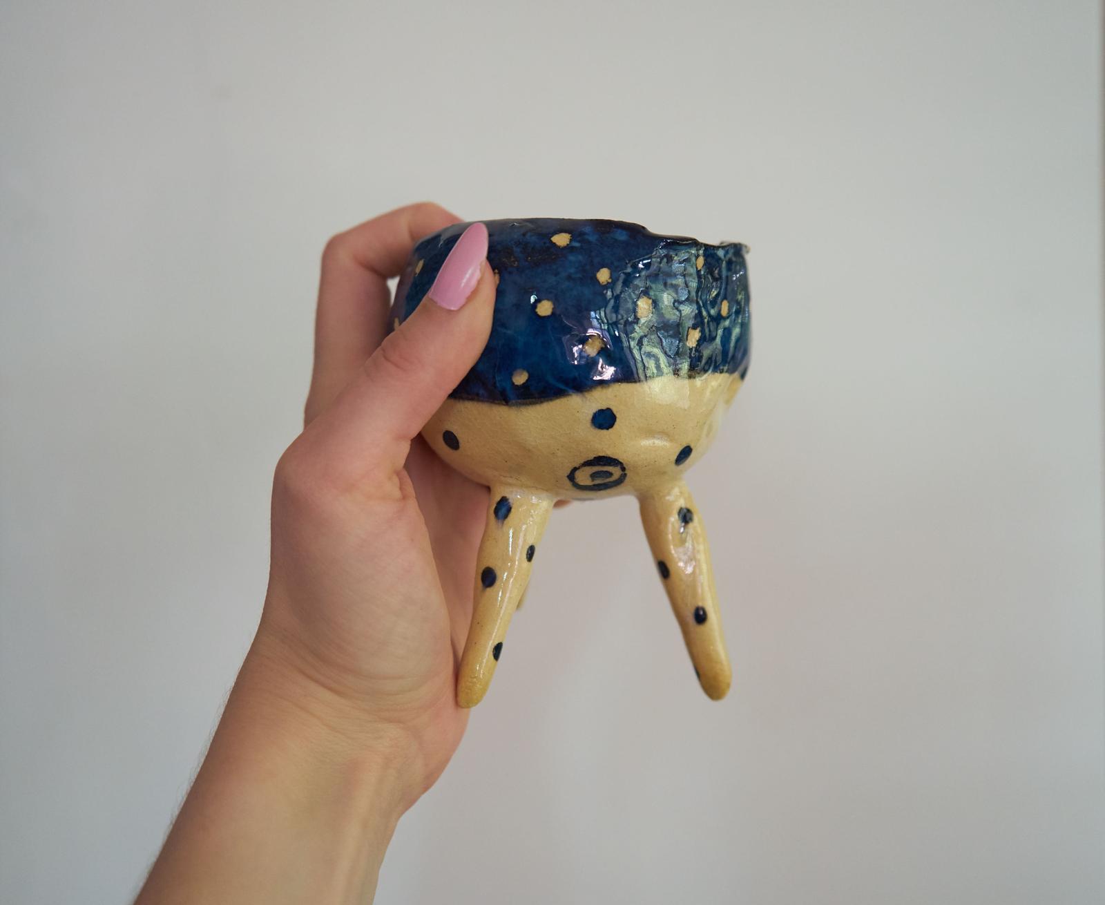 Hand made pinch pot with legs