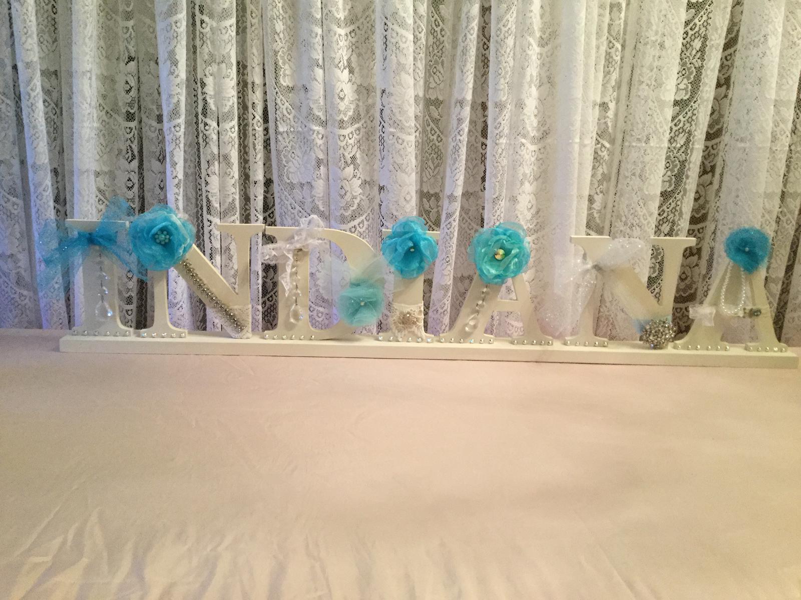 Wooden names with vintage jewellery