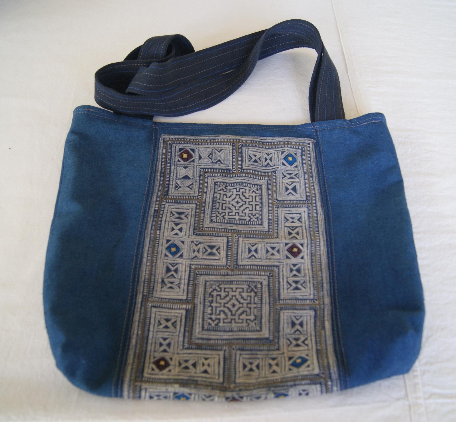 Medium indigo bag with ethnic fabric and stitching