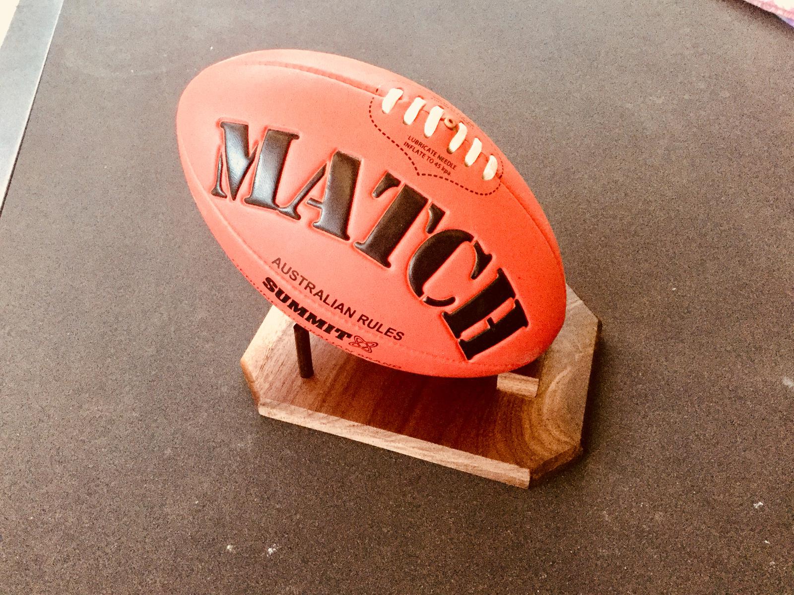 Display stand for footballs