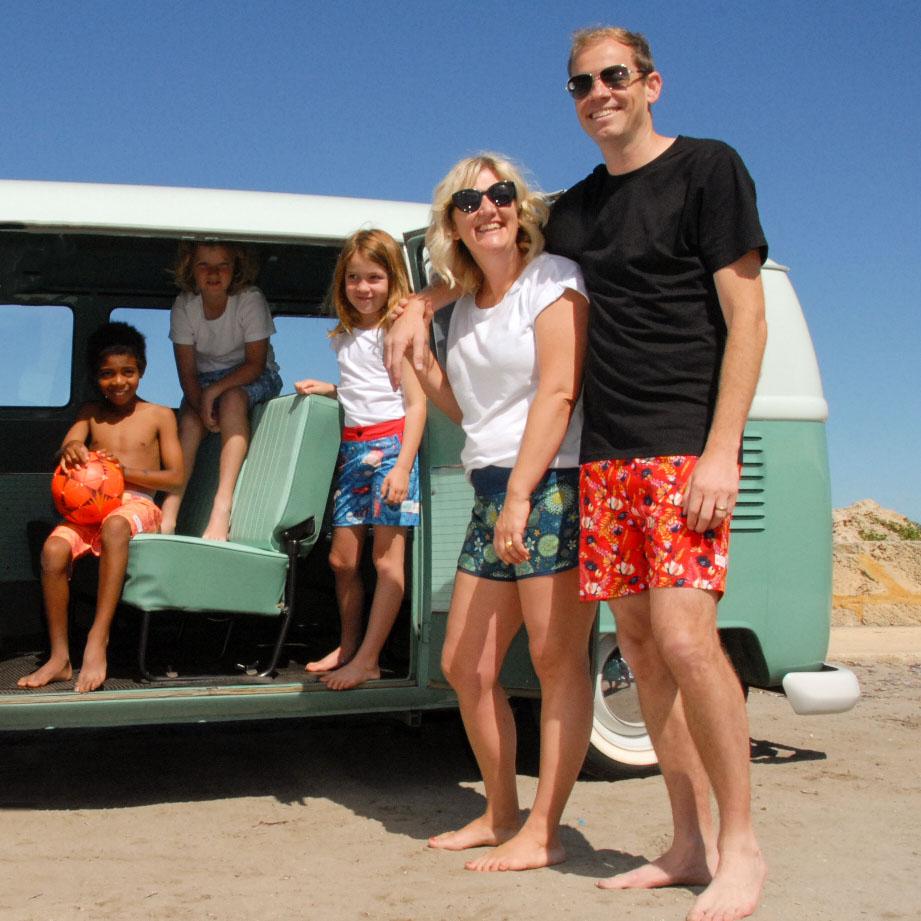 Family wearing South Beach Boardies made from recycled plastic bottles